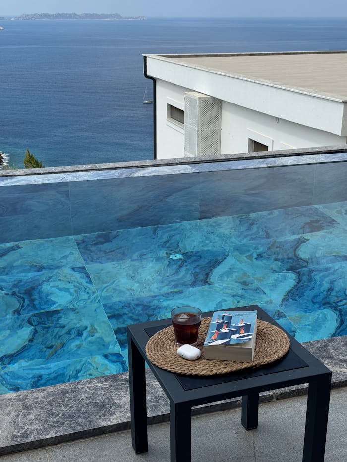 luxury-poolside-relaxation-with-ocean-view-34189613